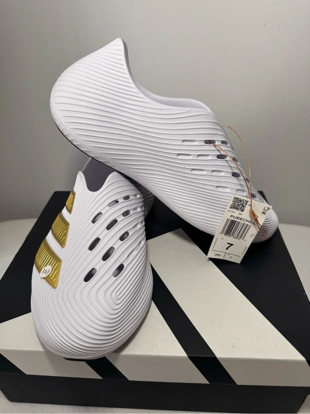 Men's White Athletic Slip-On Shoes with Gold Accents